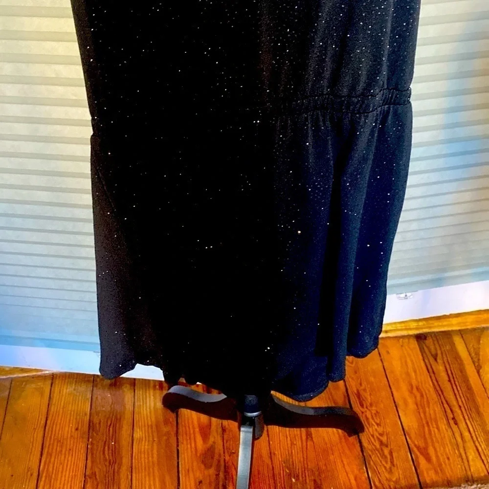 Sparkly halter top jumpsuit.‎